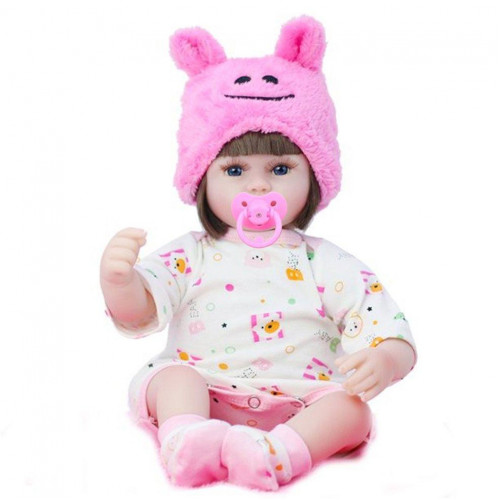 Мягконабивная кукла в розовой шапке