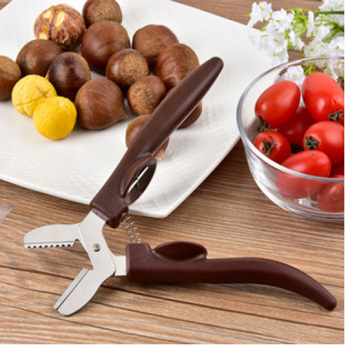 Кухонный инструмент - орехокол для каштанов коричневого цвета
