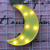 Настольный светильник в форме луны желтого цвета